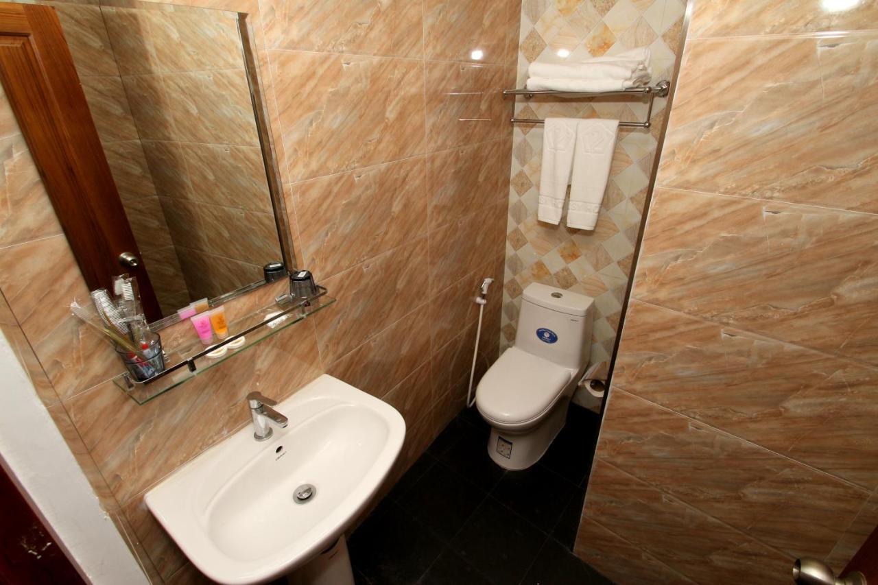 Gemsy Hotel Янгон Стая снимка